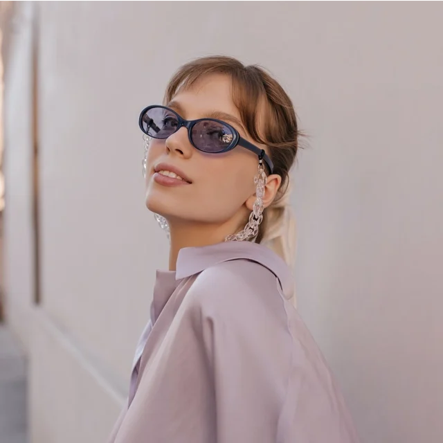 close-up-portrait-of-young-girl-in-city-pretty-brunette-wearing-silk-outfit-purple-sunglasses-wit-copy